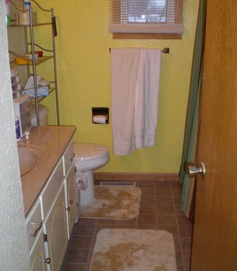 A view of the finished room with new rugs