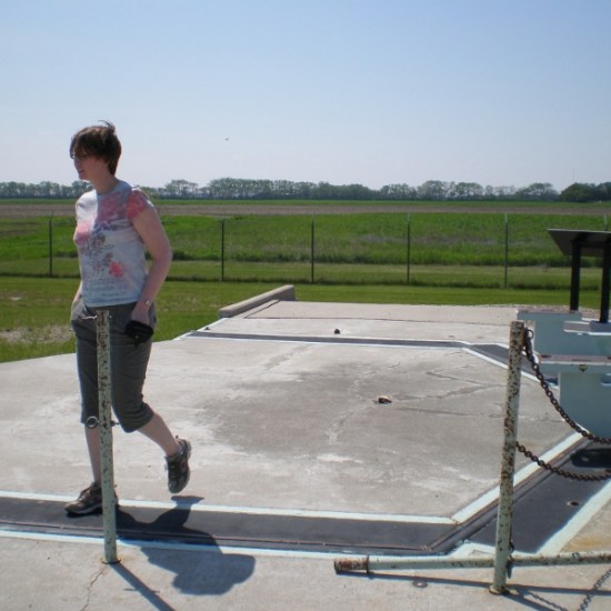 Erin walks on top of the silo